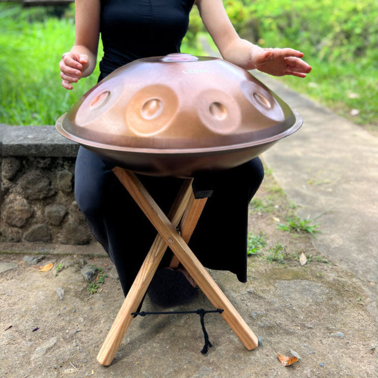 LIDAH Handpan Being Played on a Handpans Stand Outside in Nature